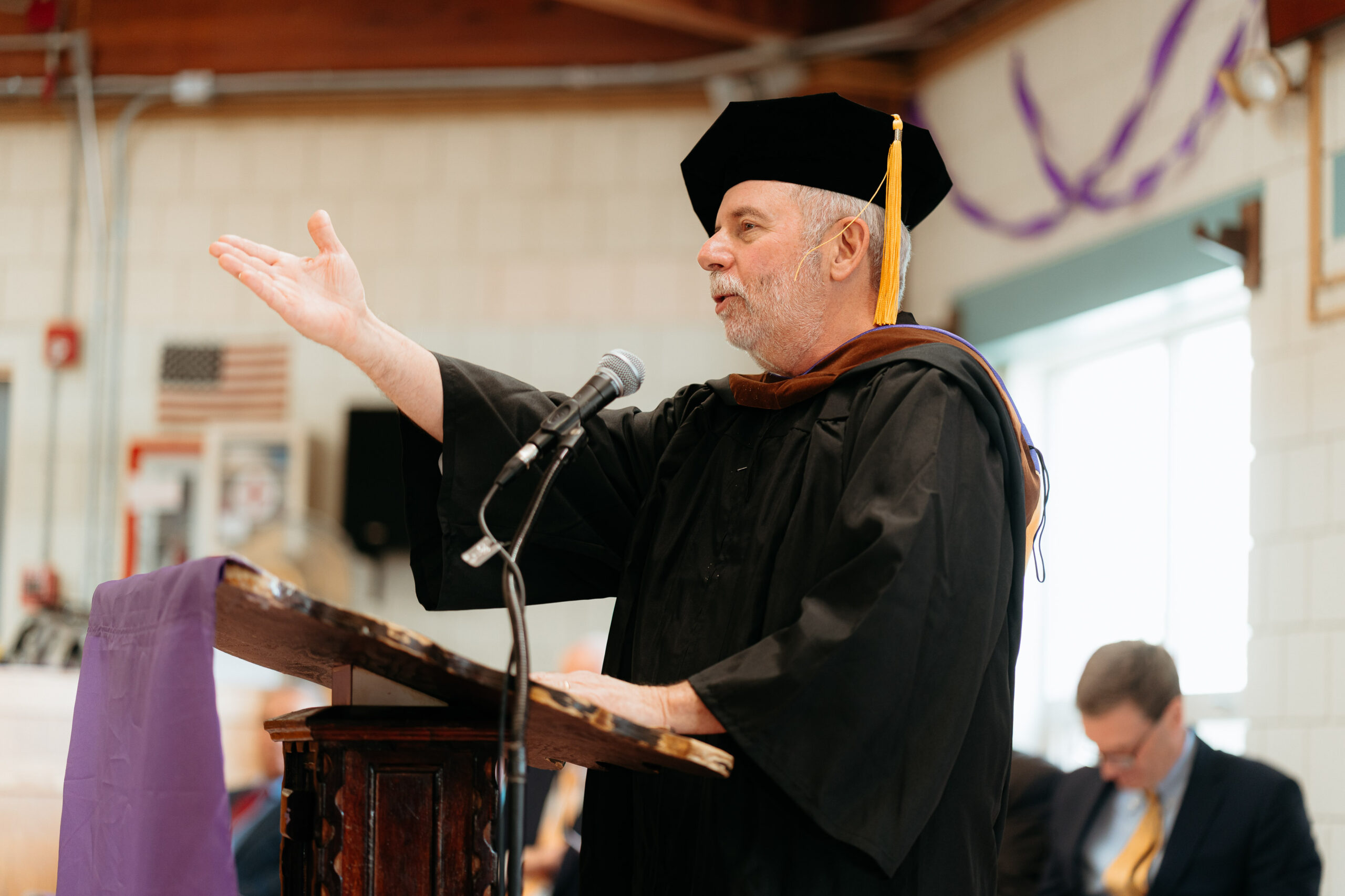 Eric Alexander, Chair of the Board of Trustees, addressing EPI graduates at commencement